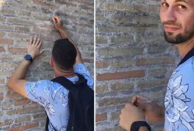 Hombre grab&oacute; su nombre y el de su novia en la pared del Coliseo Romano