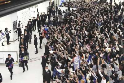 Los jugadores de Jap&oacute;n fueron recibidos con aplausos en el regreso a su pa&iacute;s. 